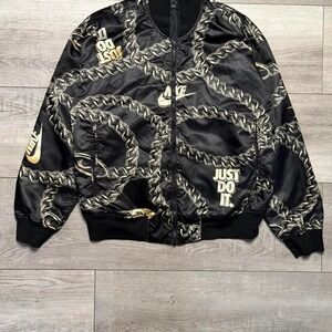 Black and‎ gold Nike bomber jacket with chain design WOMAN SIZE M